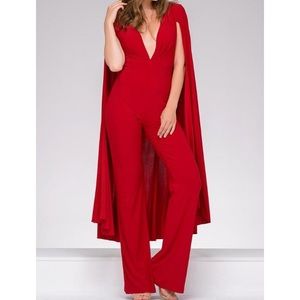 Jovani  46031A Plunging V- Neck Jumpsuit With Cape